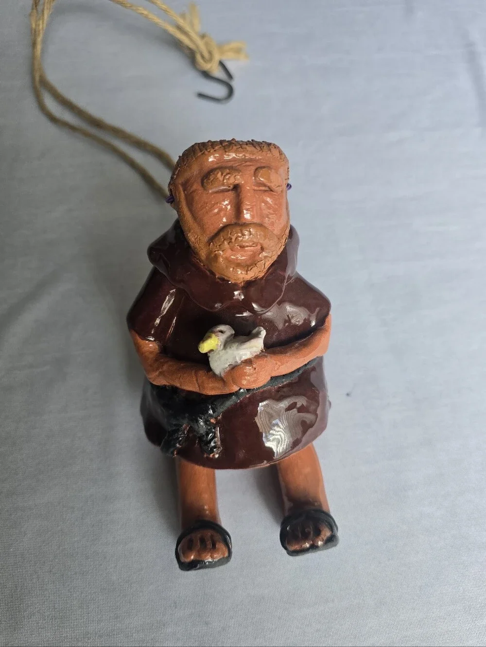 Handcrafted Brown Ceramic Glazed Terra Cotta Clay Monk Ornament with Dove Piece